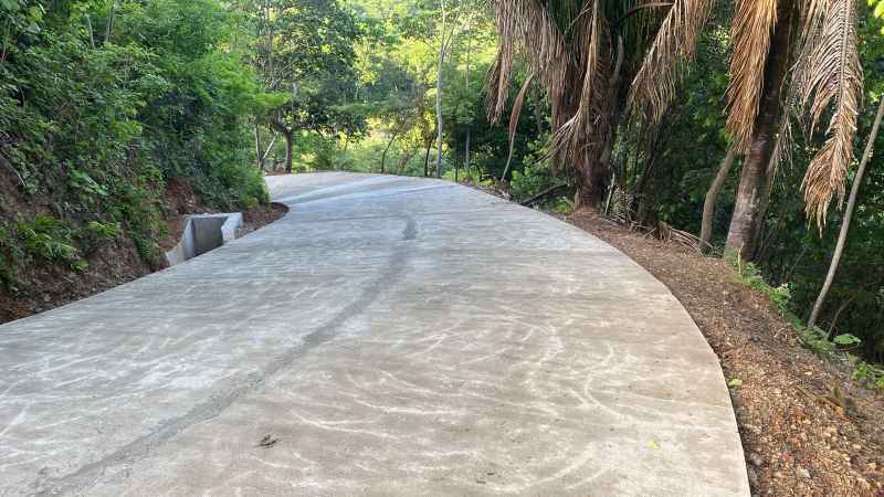 Home under construction at Nosara Estates showing structural progress and building framework in Nosara
