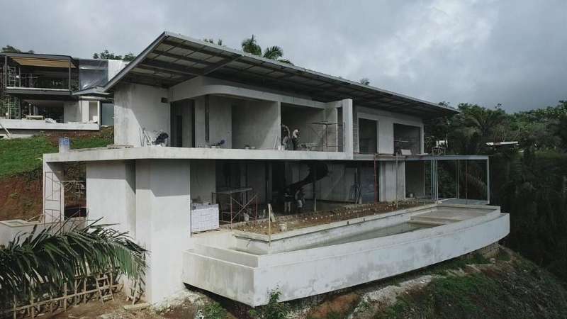 Home under construction at Nosara Estates showing structural progress and building framework in Nosara