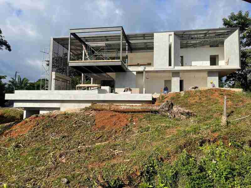 Home under construction at Nosara Estates showing structural progress and building framework in Nosara