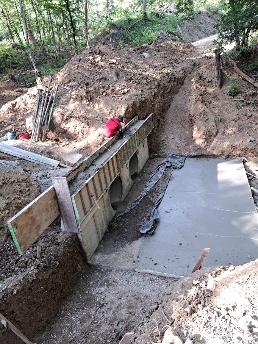 Drainage channel construction alongside the bridge