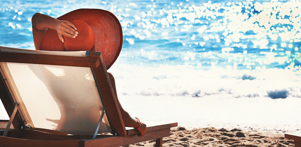 woman sitting on the beach in nosara costa rica