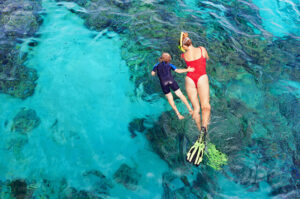 Family Snorkeling on the Ocean